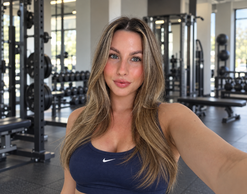 Penelope, personal fitness coach, in a modern gym